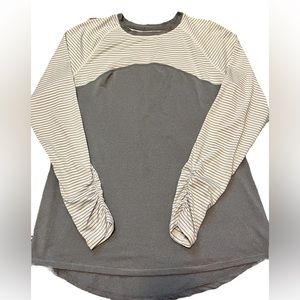 Avia Moisture Wicking Long Sleeve Top with cinched seams at wrists.